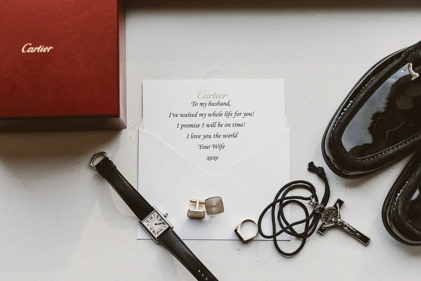 Branon's Cartier watch, cufflinks, shoes and a note from Celeste