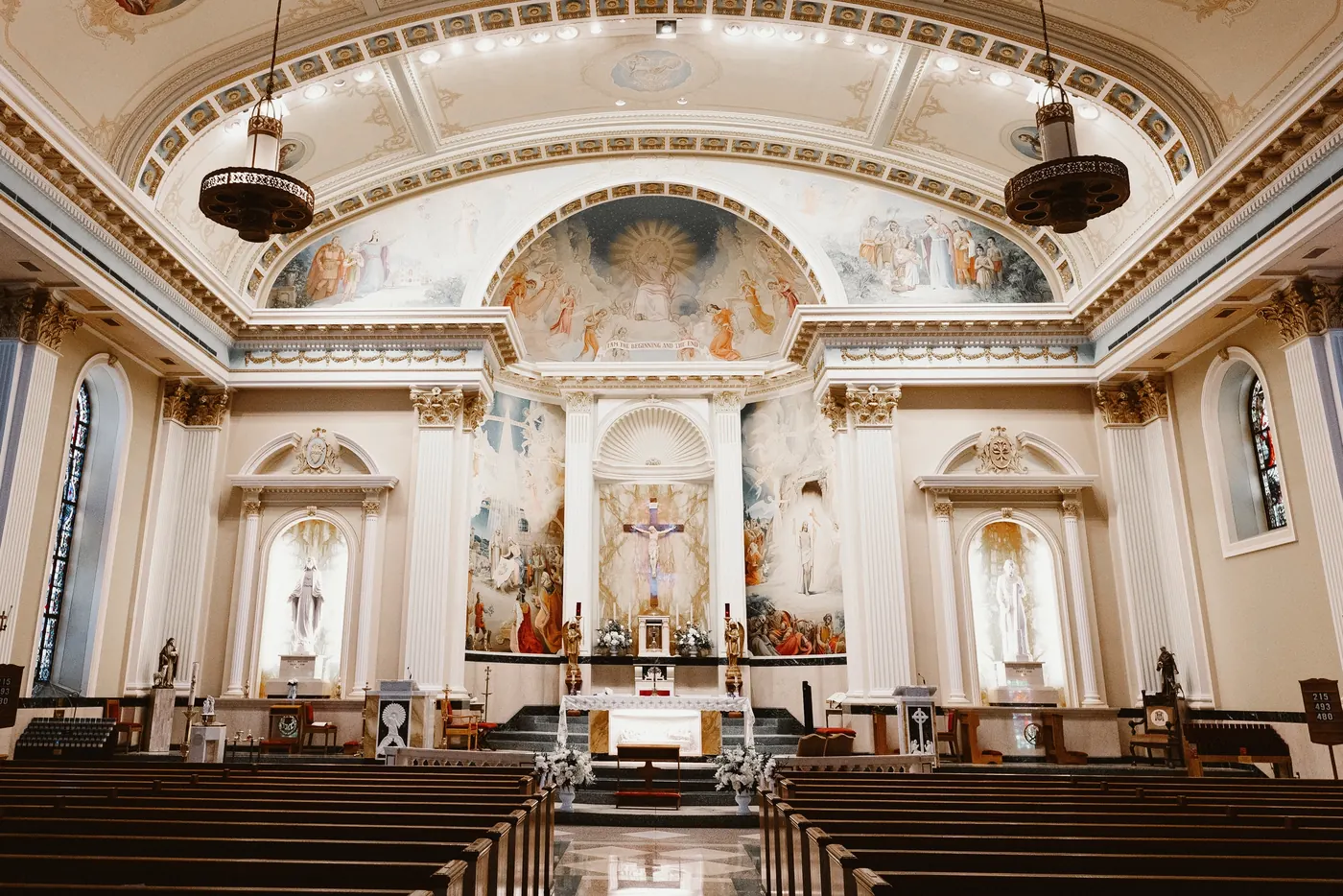 The ornate painted interior of Saint Monica Roman Catholic Church in South Philadelphia before the ceremony