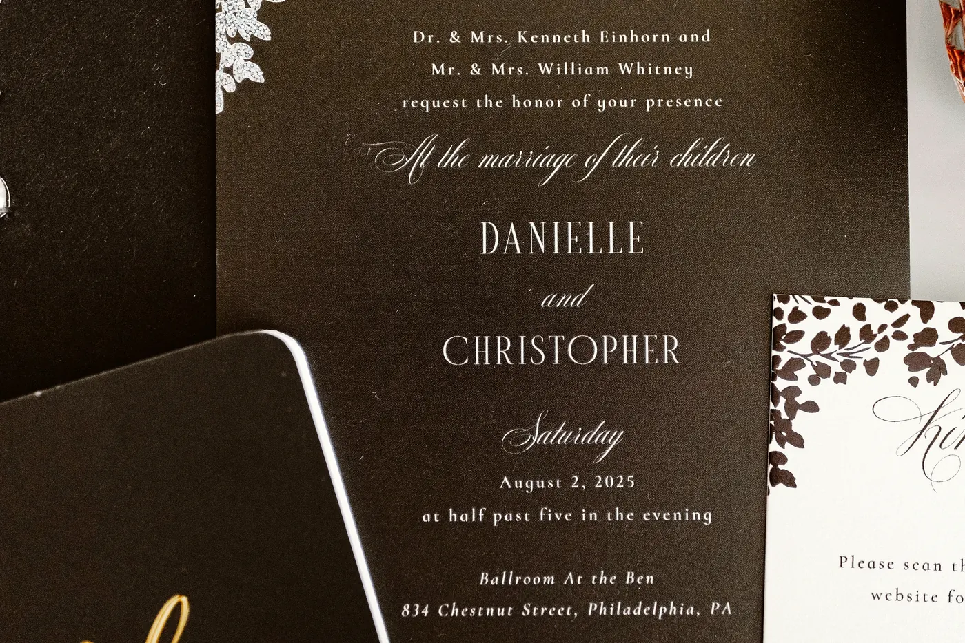 Black and white wedding invitation for Danielle and Christopher at the Ballroom at the Ben