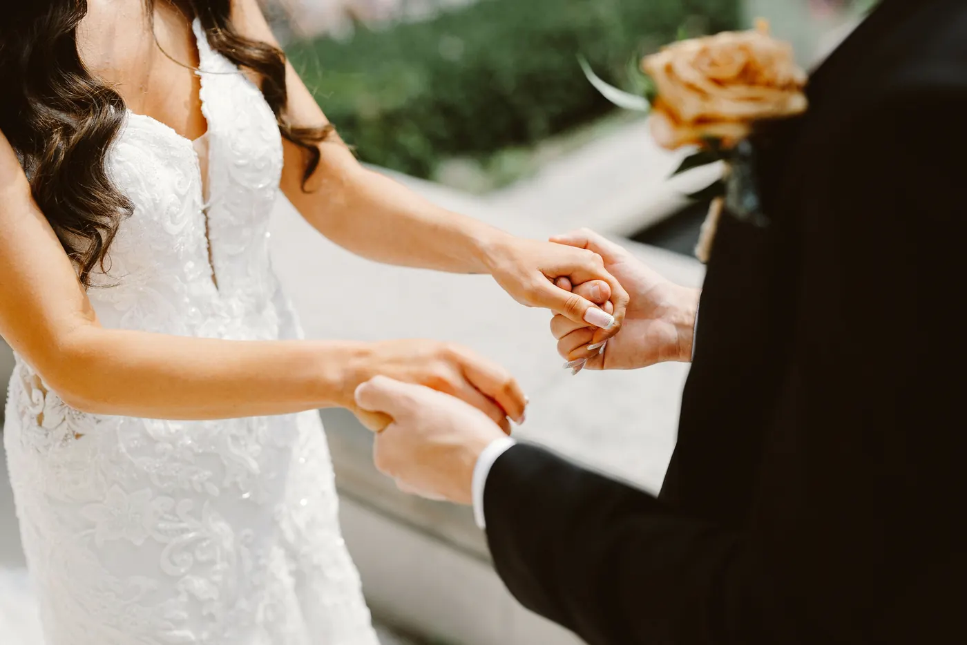 Close-up of Chris and Danielle holding hands during their first look at the Rodin Museum in Philadelphia
