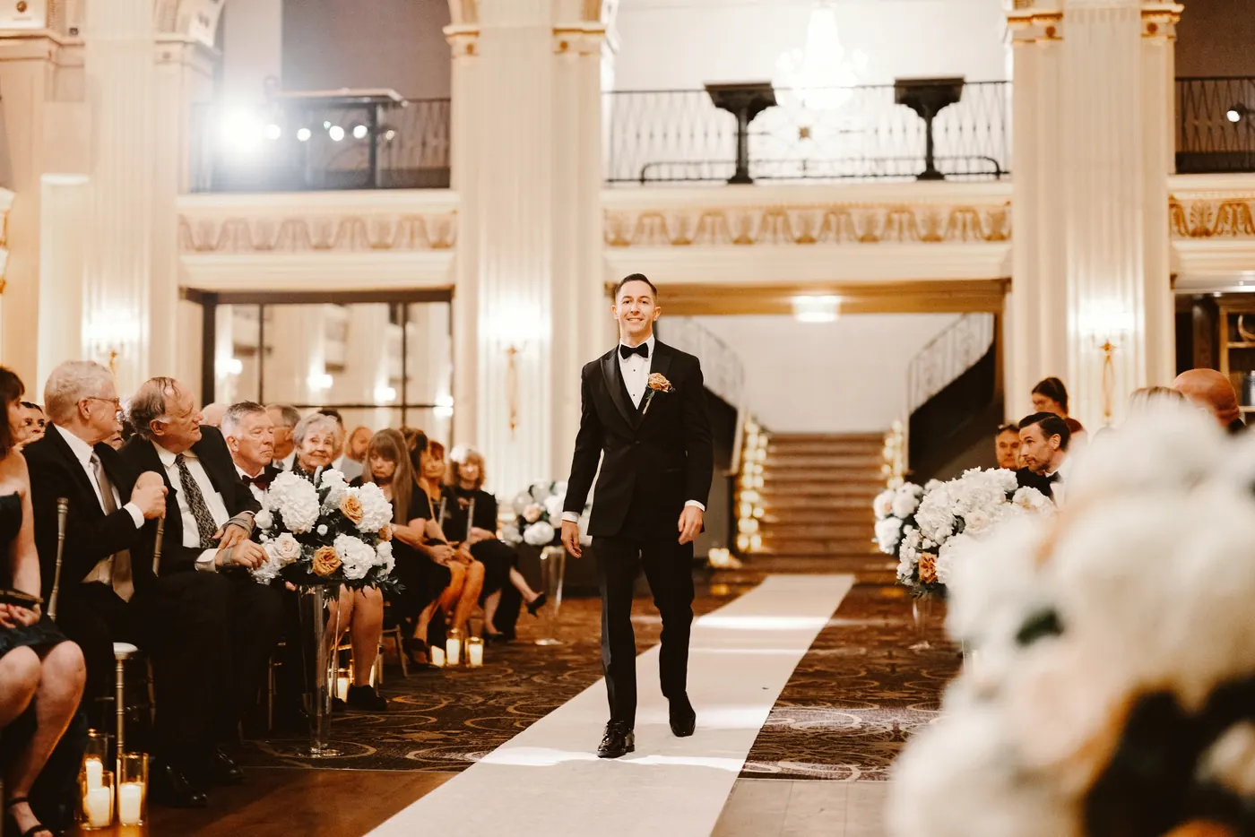 Chris walking down the aisle at Cescaphe Ballroom at the Ben in Philadelphia