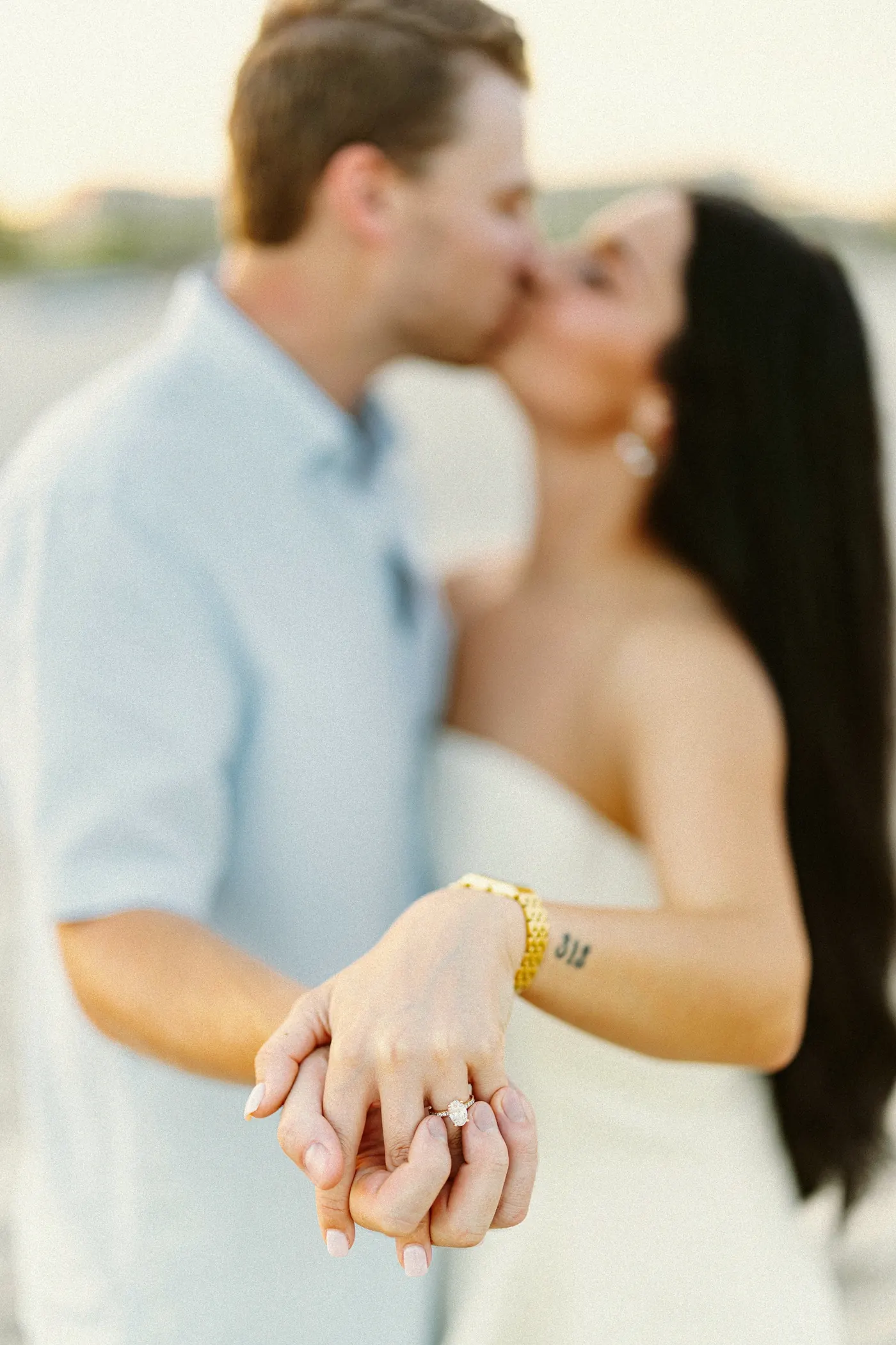 Close-up of Morgan's engagement ring as Mason kisses her