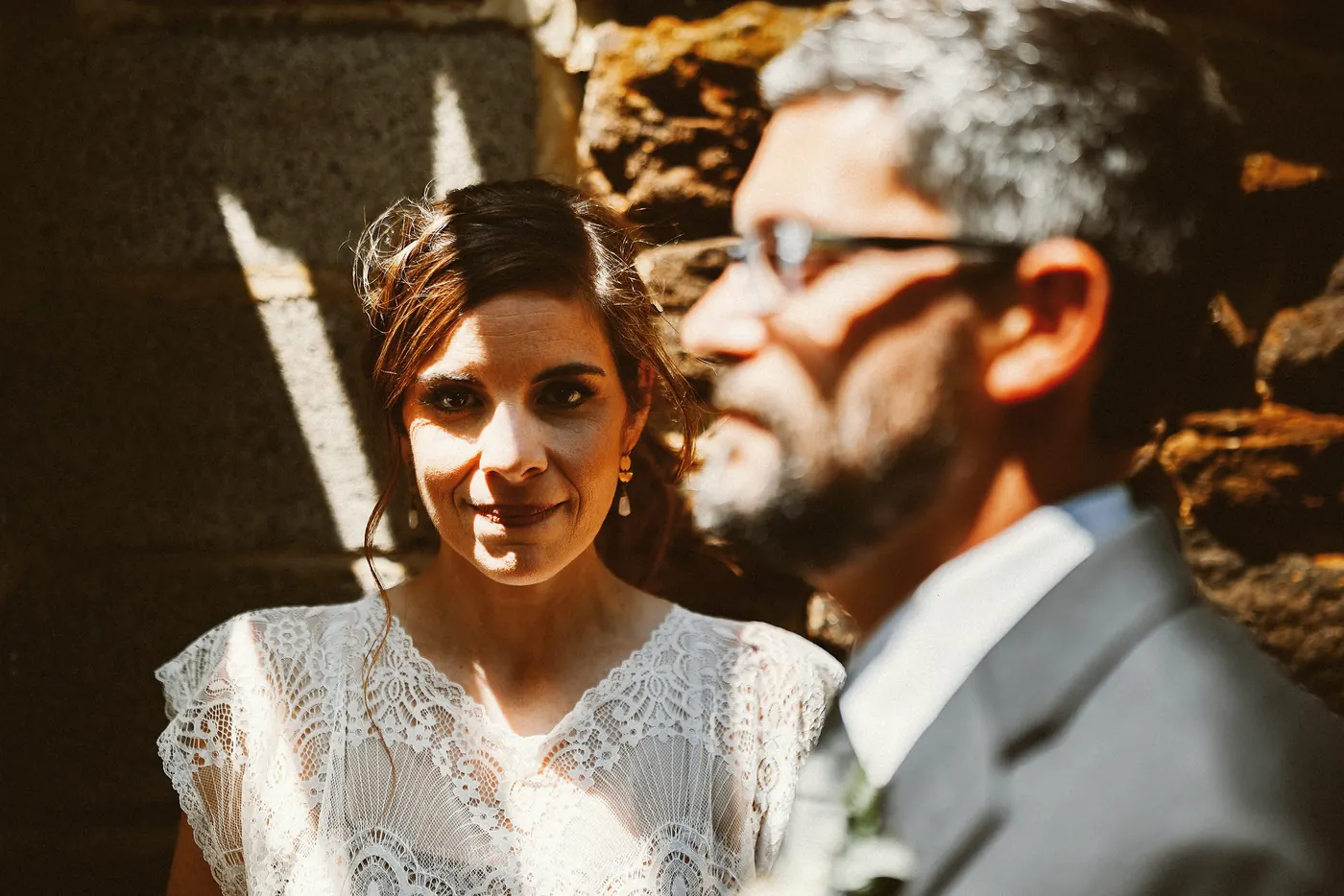 Erica and Matt in dramatic light by the old stone barn at Johnson's Locust Hall Farm in Jobstown, NJ