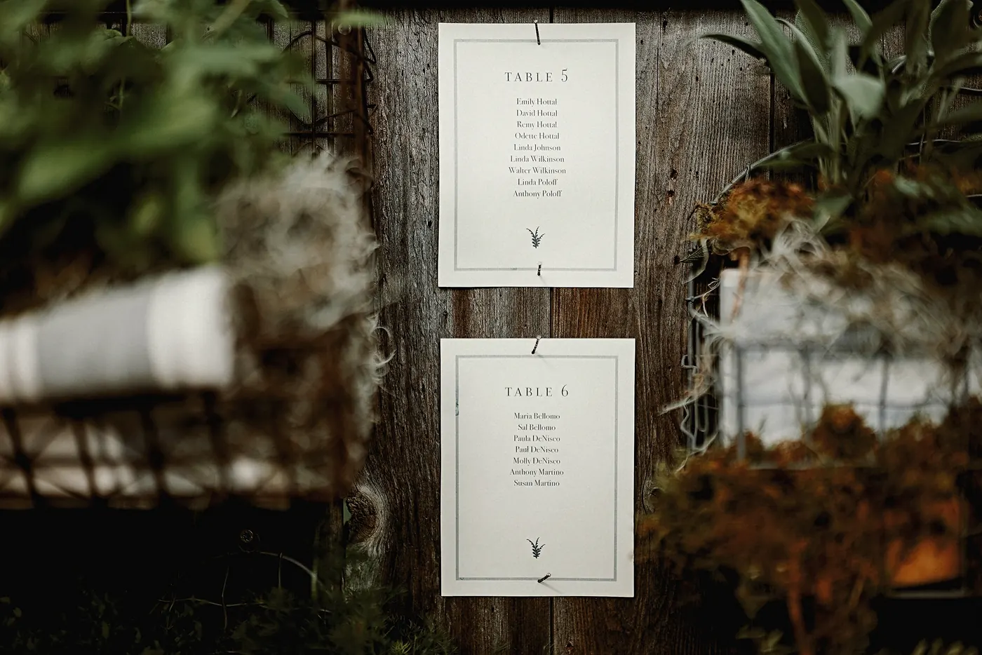 Close-up of the hanging table cards on the seating chart at Johnson's Locust Hall Farm in Jobstown, NJ