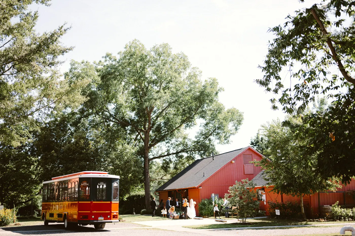 The wedding trolley arriving at the red barn at Bishop Farmstead in Shamong, NJ